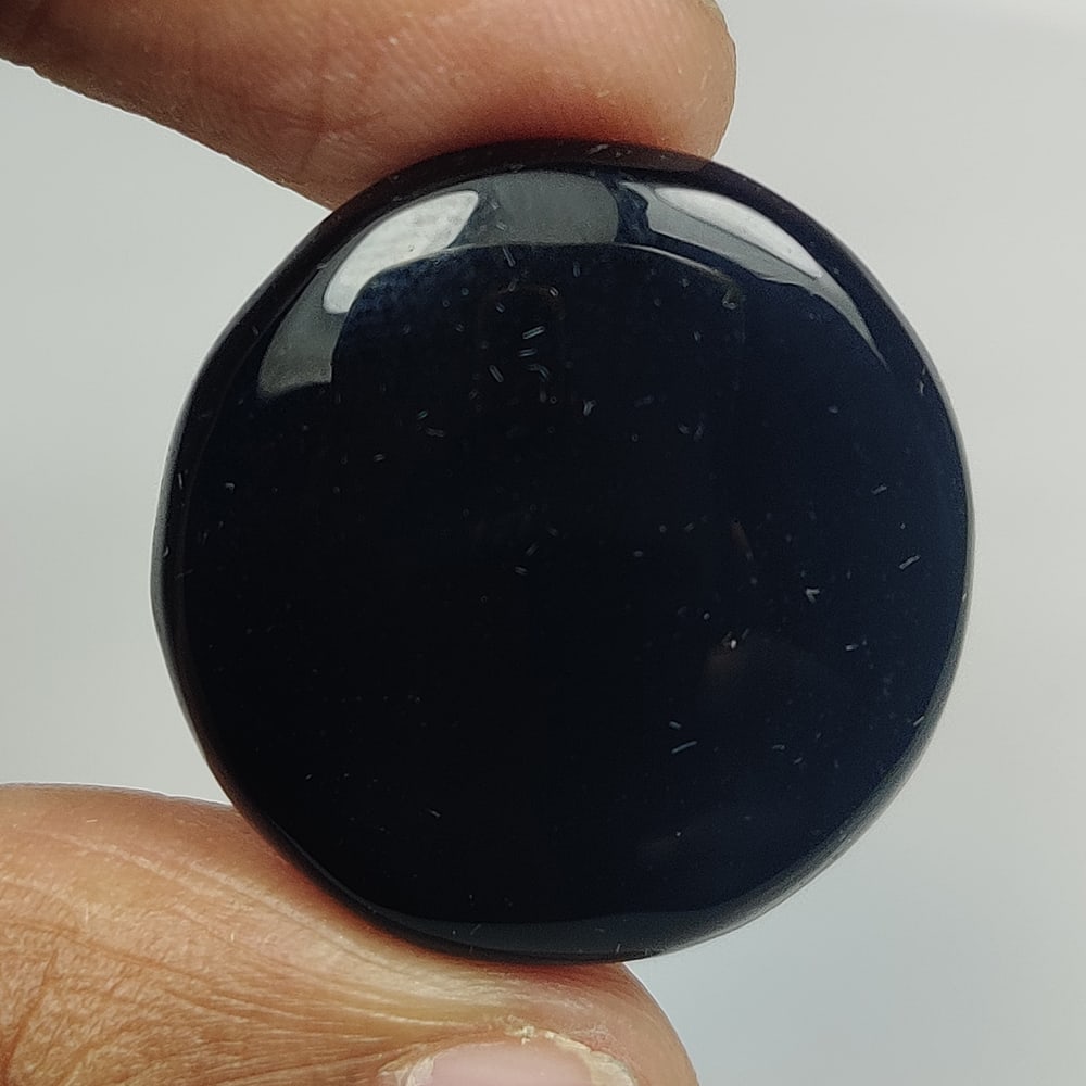 19.97 Ct Natural Black Onyx Round Cab: Weight - 19.97 Ct / Size - 21.90 x 21.90 x 4.90 mm / Shape - Round Cab / Clarity - Opaque / Origin - Brazil / Treatment - None