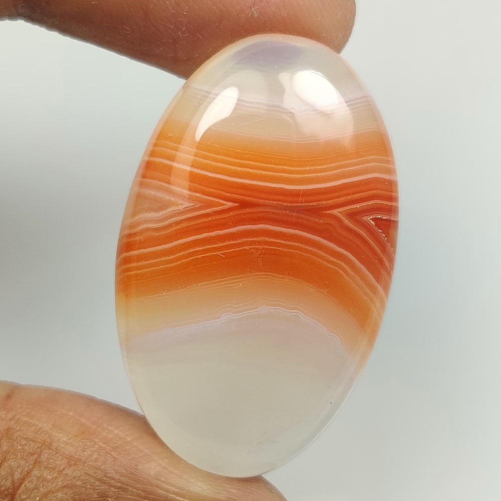 23.74 Ct Natural Orange Banded Agate Oval Cab: weight - 23.74 Ct / Size - 28.00 x 17.70 x 5.90 mm / Shape - Excellent Oval Cab / Origin - Brazil / Treatment - None