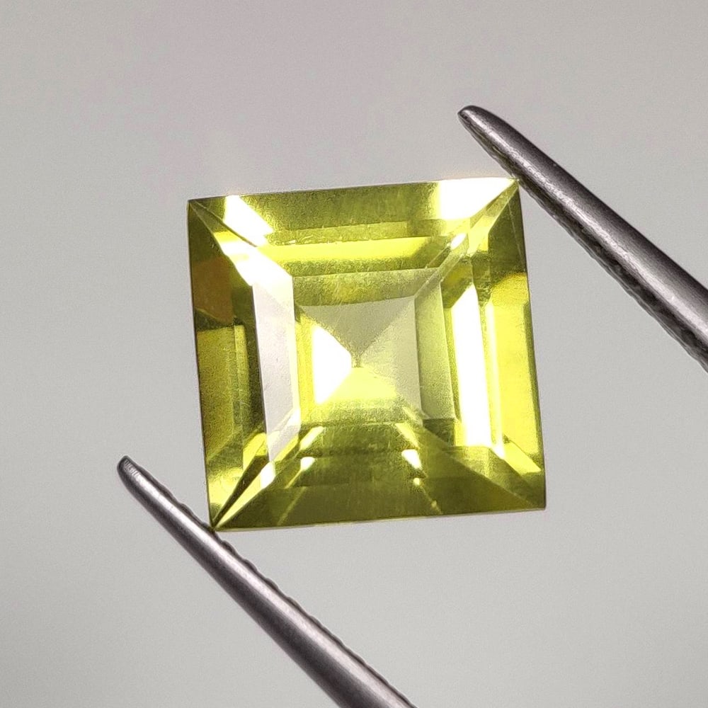 4.18 Ct Natural Lemon Quartz Square Cut: Weight - 4.18 Ct / Dimensions - 10.20 x 10.10 x 6.90 mm / Shape & Cut - Square Cut / Color - Greenish Yellow / Transparency - Transparent / Comments - Heated