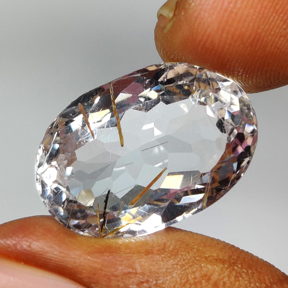 21.48 Ct Natural Rutile Quartz Oval Cut: Weight - 21.48 Ct / Dimensions - 22.00 x 14.80 x 10.70 mm / Shape & Cut - Oval Cut / Transparency - Transaprent / Origin - Norway / Comments - None