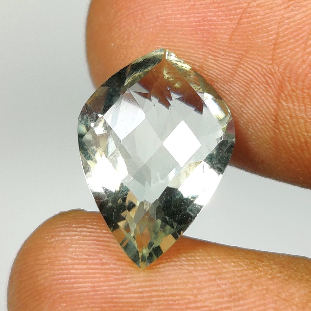 5.26 Ct Natural Green Amethyst Fancy Cut: Weight - 5.26 Ct / Size -15.90 x 11.20 x 6.60 mm / Shape - Fancy Cut / Color - Green / Clarity - VVS / Origin - Brazil / Treatment - Heated
