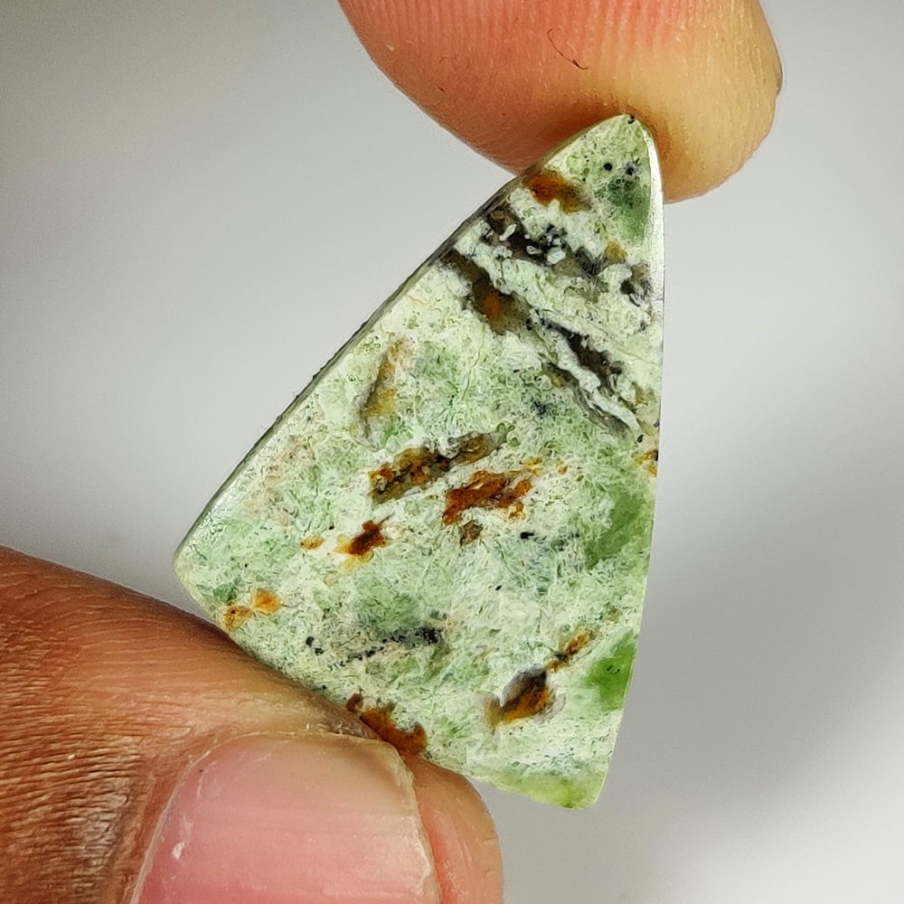 10.95 Ct Natural Green Serpentine Fancy Cab: Weight - 10.95 Ct / Dimensions - 24.00 x 17.10 x 5.50 mm / Shape - Fancy Cab / Clarity - Translucent / Origin - Brazil / Treatment - None