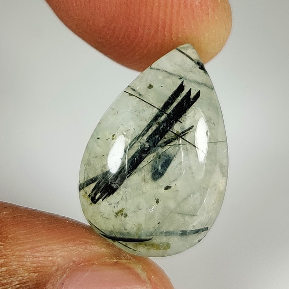 11.35 Ct Natural Green Rutile Prehnite Pear Cab: Weight - 11.35 Ct / Dimensions - 18.00 x 12.00 x 6.20 mm / Shape - Pear Cab / Clarity - Semi Transaprent / Origin - India / Comments - None