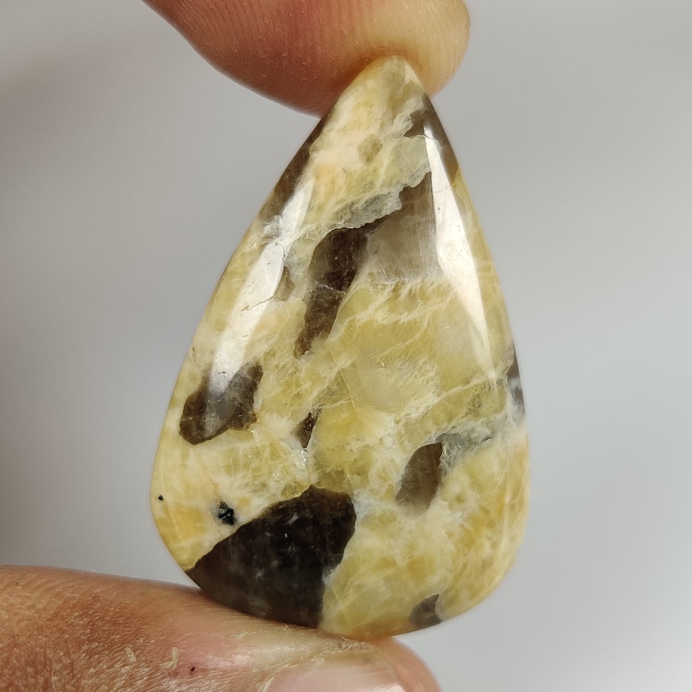 29.44 Ct Natural Graphic Feldspar Pear Cab: Weight - 29.44 Ct / Dimensions - 34.00 x 21.70 x 5.90 mm / Shape - Pear Cab / Clarity - Opaque / Origin - Brazil / Treatment - None