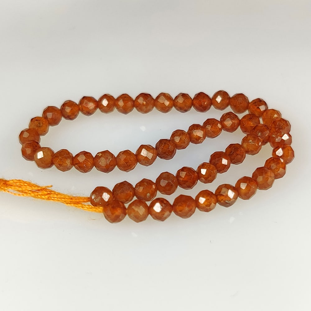 16.49 Ct Natural Hessonite Garnet Round Cut Beads: Weight - 16.49 Ct / Size - 3.10 - 3.50 mm / 50 Pc's / 7" inches / Shape - Round Cut Beads / Clarity - SI / Origin - Nigeria / Treatment - None