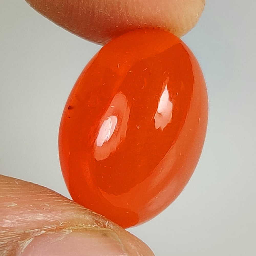 10.82 Ct Natural Carnelian Oval Cab: Weight - 10.82 Ct / Dimensions - 16.30 x 11.40 x 8.10 mm / Shape & Cut - Oval cab / Transparency - Semi - Opaque / Origin - Brazil
