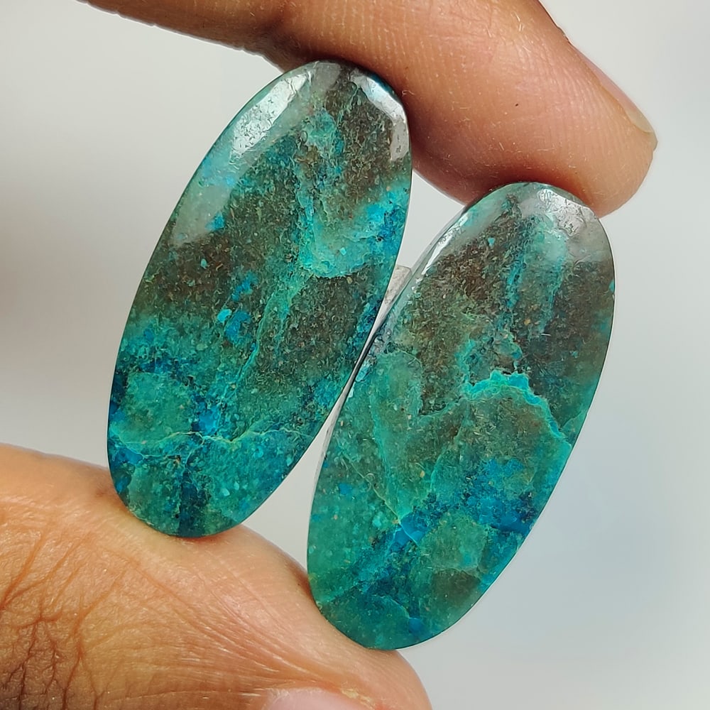 26.23 Ct Natural Shattuckite Quartz Oval Cab Pair: weight - 26.23 Ct / Size - 25.20 x 11.60 x 4.80 mm / 2 Pc's / Shape - Excellent Oval Cab / Origin - Brazil / Treatment - None