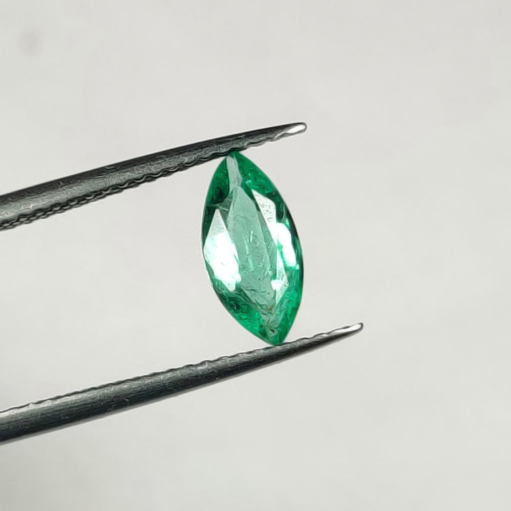 0.74 Ct Natural Zambian "VVS" Green Emerald Marquise Cut: Weight - 0.74 Ct / Dimensions - 9.70 x 4.50 x 2.80 mm/ Shape - Marquise Cut / Color - Green / Clarity - VVS / Origin - Zambia / Treatment - Natural Emeralds are commonly enhanced by oil