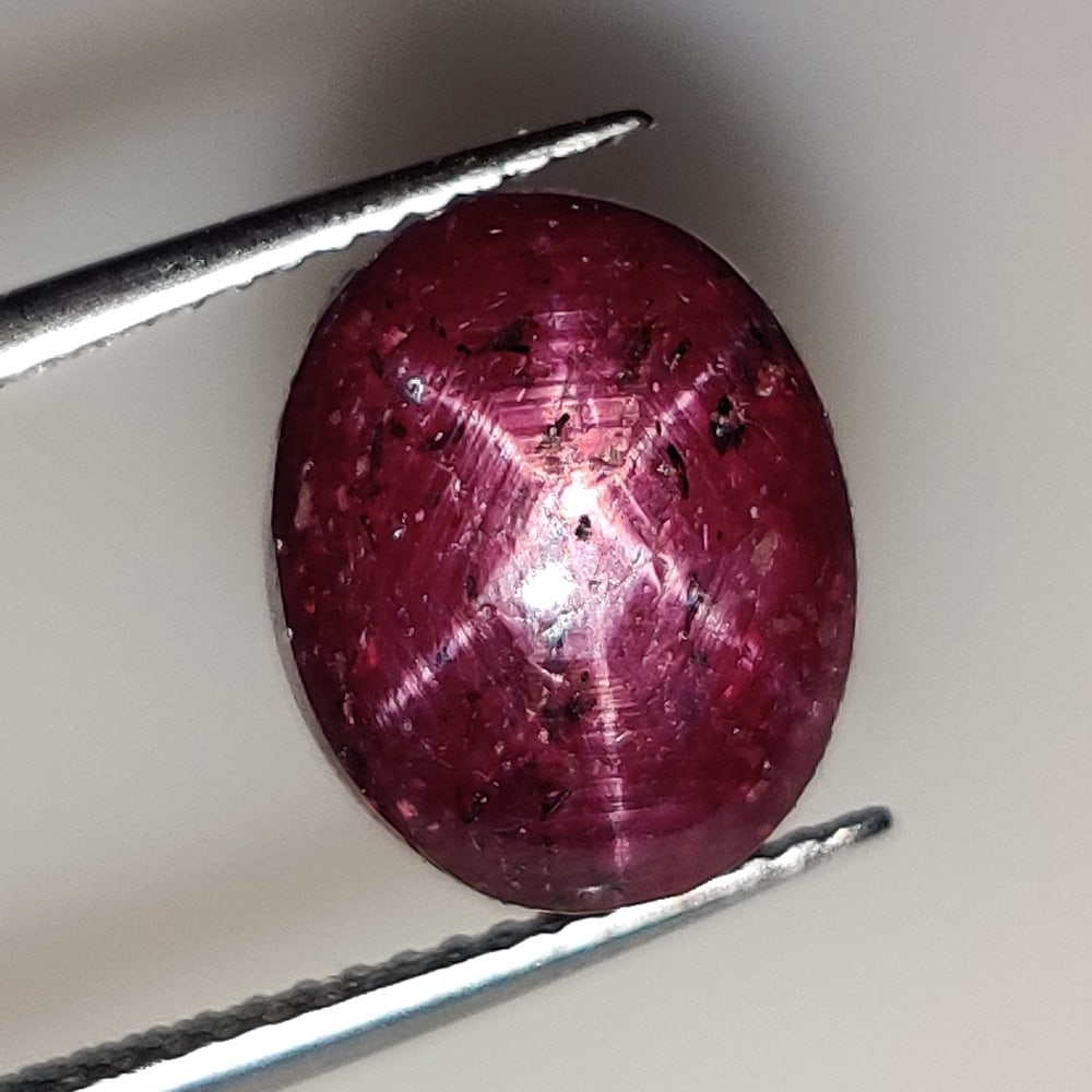 10.32 Ct Natural Six Line Star Ruby Oval Cab: Weight - 10.32 Ct / Size - 11.80 x 9.70 x 7.40 mm / Shape - Oval Cabochon / Clarity - Opaque / Origin - India / Treatment - None