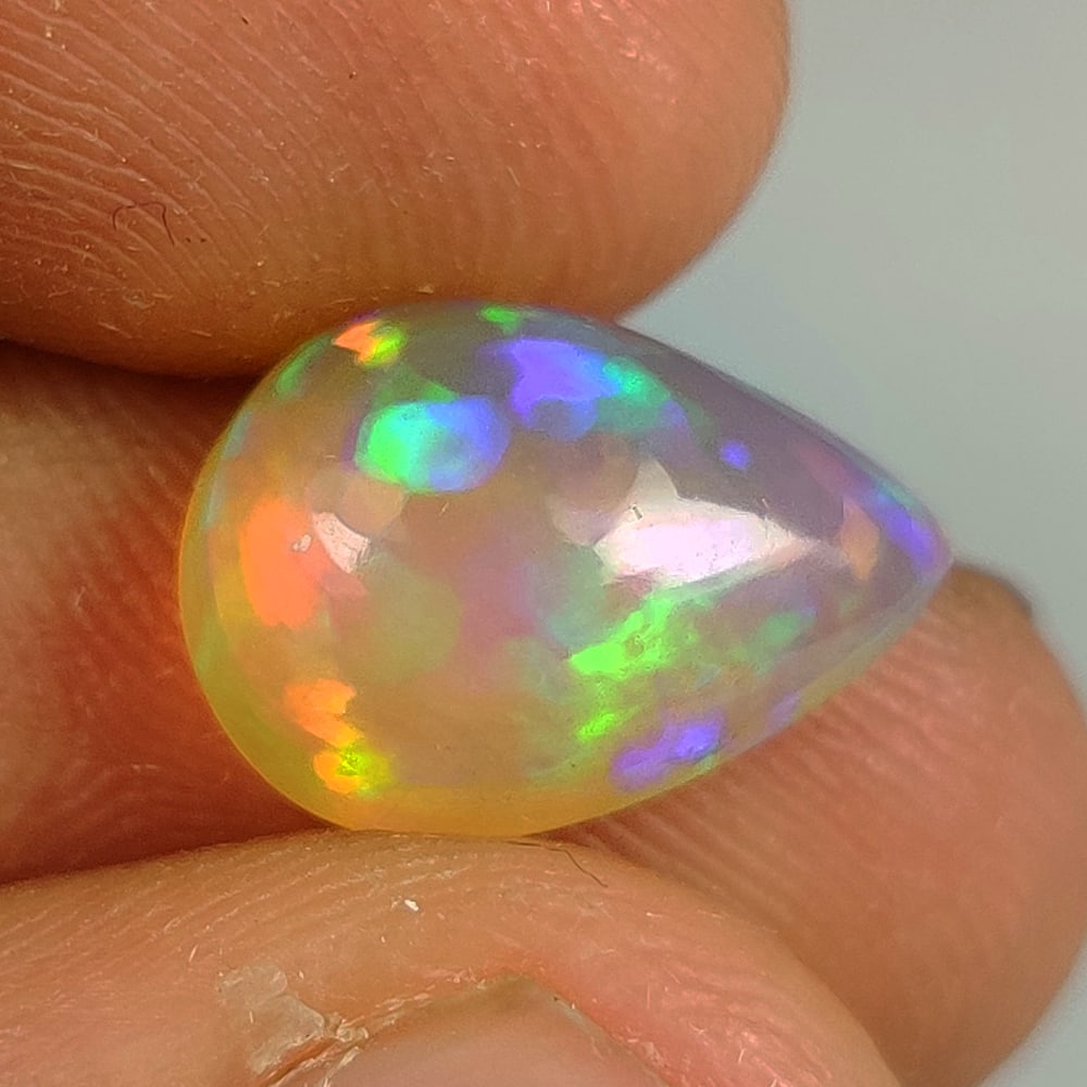 3.05 Ct Natural Multicolor Welo Opal Top Fire Pear Cab (1 of 2)