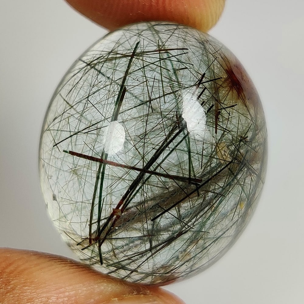 46.31 Ct Natural Rutile Quartz Oval Cab: Weight - 46.31 Ct / Dimensions - 25.00 x 21.00 x 12.90 mm / Shape & Cut - Oval Cab / Transparency - Transaprent / Origin - Norway / Comments - None
