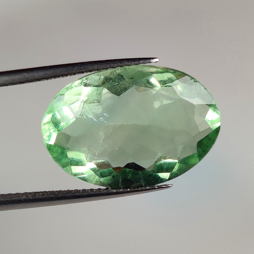 14.02 Ct Natural Green Flourite Oval Cut: Weight - 14.02 Ct / Dimensions - 19.50 x 13.50 x 7.70 mm / Shape & Cut - Oval Cut / Transparency - VVS / Origin - Brazil / Comments - None