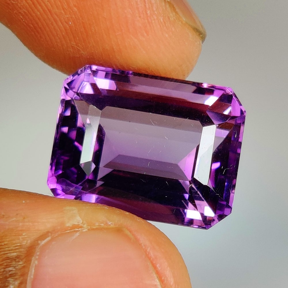 15.66 Ct Natural Purple Amethyst Octagon Cut: Weight - 15.66 Ct / Dimensions - 15.80 x 12.40 x 10.50 mm / Shape - Octagon Cut / Color - Purple / Clarity - VVS / Origin -Brazil / Treatment - Heated
