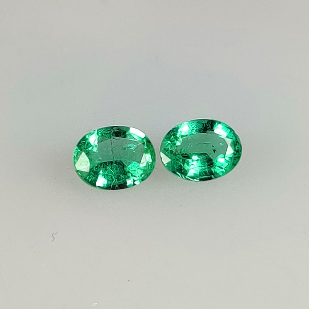 0.65 Ct Natural Zambian Bluish Green Emerald-Oval Pair: Weight - 0.65 Ct / Dimensions - 5.20 x 4.10 x 2.50 mm/ 2 Pc's / Shape - Oval Cut / Color - Green / Clarity - SI / Origin - Zambia / Treatment - Natural Emeralds are commonly enhanced by oil