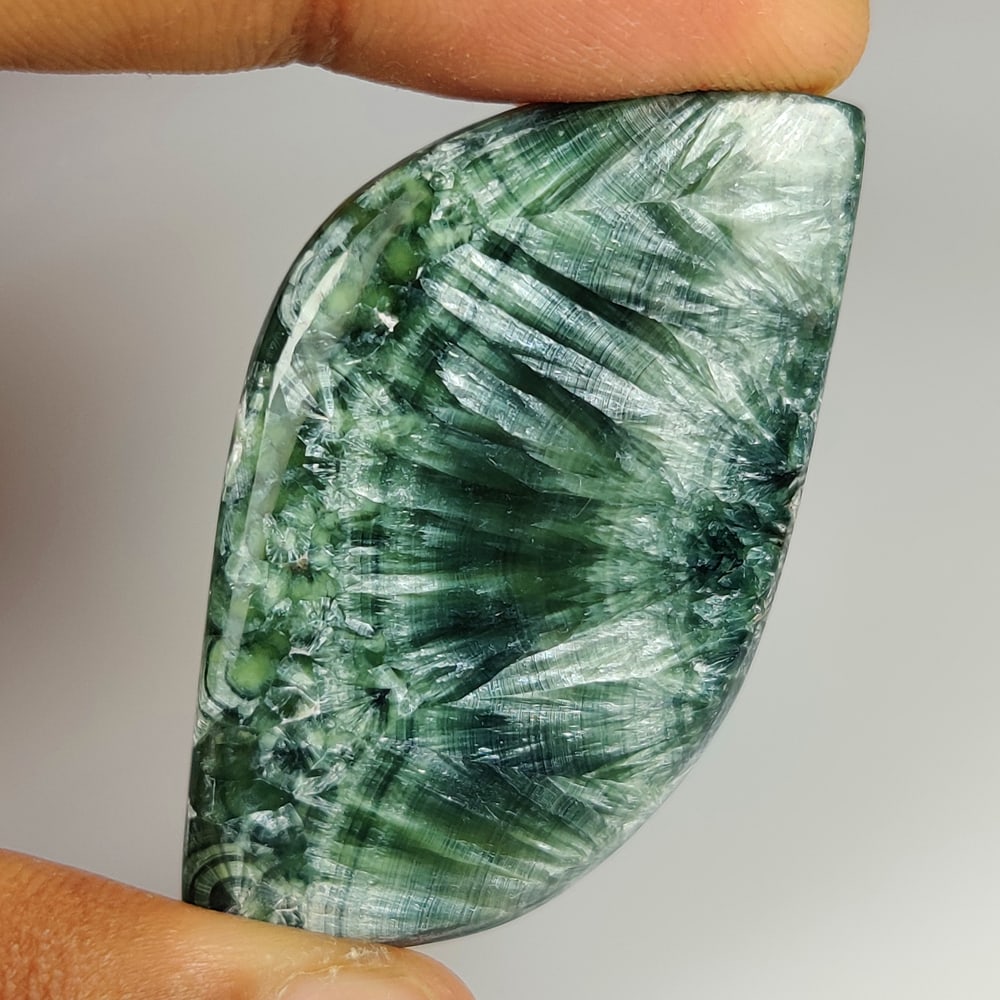 62.13 Ct Natural Seraphinite Fancy Cab: weight - 62.13 Ct / Dimensions - 49.00 x 28.00 x 5.70 mm / Shape - Excellent Fancy Cab / Origin - Brazil / Treatment - None