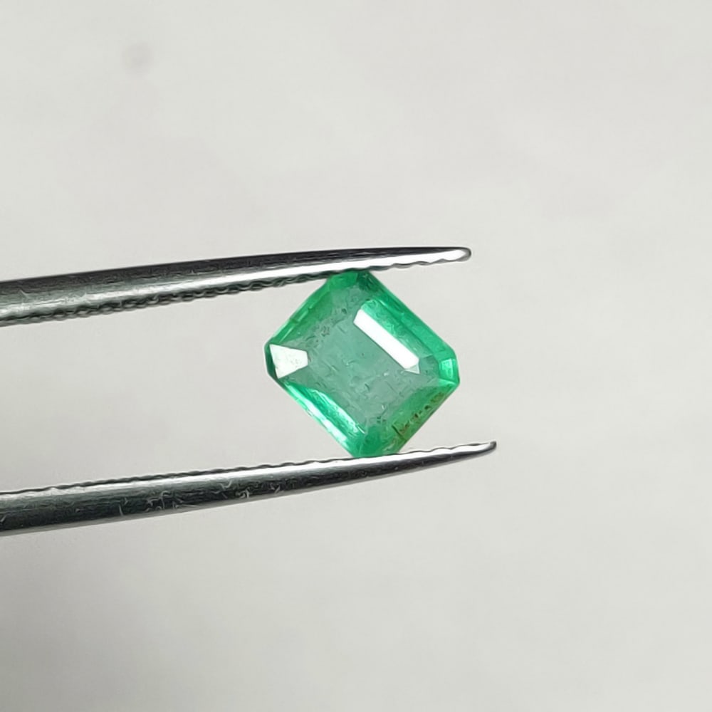 0.88 Ct Natural Zambian Green Emerald Octagon Cut: Weight - 0.88 Ct / Dimensions - 5.30 x 5.40 x 3.30 mm/ Shape - Octagon Cut / Color - Green / Clarity - SI / Origin - Zambia / Treatment - Natural Emeralds are commonly enhanced by oil