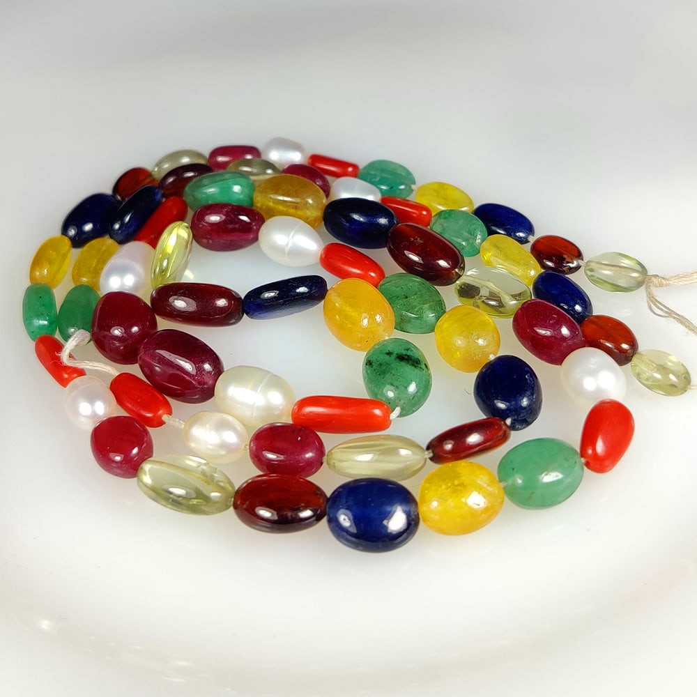 142.32 Ct Natural Semi Precious Multistones Dumbbell Beads: Weight - 142.32 Ct / Dimensions - 6.5x5.1 - 10.2x7.2 mm / 64 Pc's / 11" Inches / Shape - Dumbbell Beads / Color - Multicolor / Clarity - VVS / Origin - Brazil / Treatment - None /