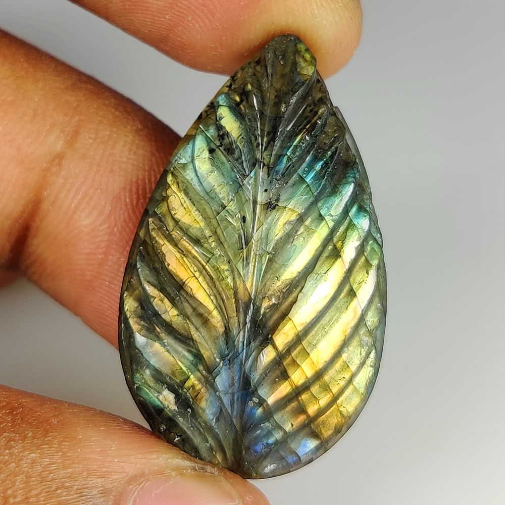 36.06 Ct Natural Blue Shaded Labradorite Pear Cab: Weight - 36.06 Ct / Size - 36.00 x 20.80 x 6.70 mm / Shape - Pear Cab / Clarity - Opaque / Origin - Africa / Treatment - None