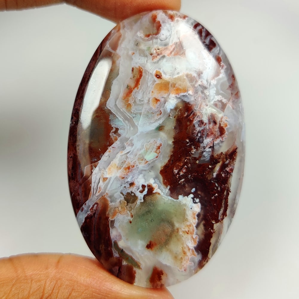 72.75 Ct Natural Crazy Lace Agate Oval Cab: Weight - 72.75 Ct / Size - 48.00 x 31.00 x 5.80 mm / Shape - Excellent Oval Cab / Clarity - Opaque / Origin - Brazil / Treatment - None