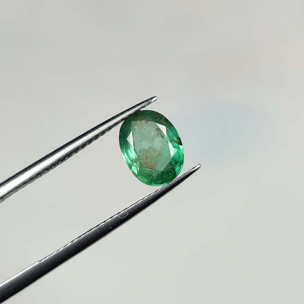 1.43 Ct Natural Zambian Green Emerald-Oval Cut: Weight - 1.43 Ct / Dimensions - 8.50 x 6.50 x 3.80 mm / Shape - Oval Cut / Color - Green / Clarity - SI / Origin - Zambia / Treatment - Natural Emeralds are commonly enhanced by oil