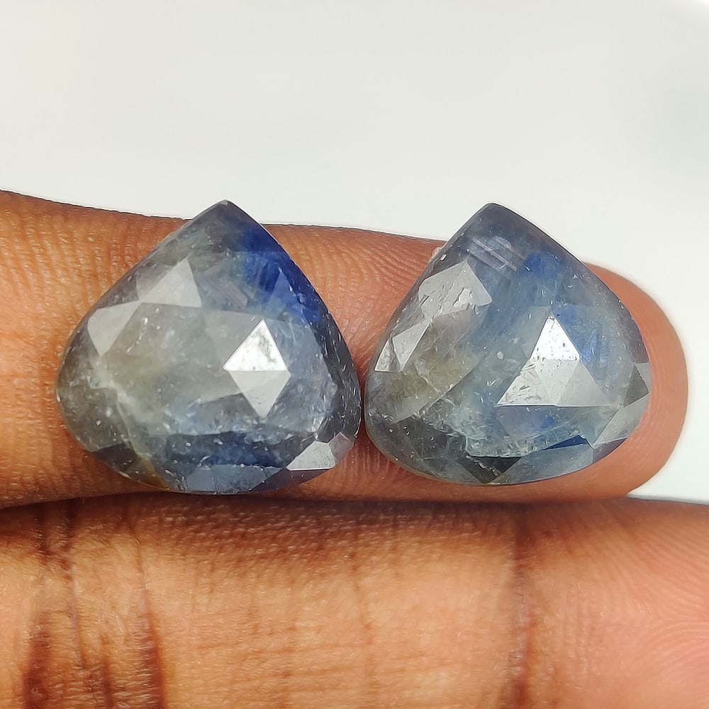 19.87 Ct Natural Sapphire Pear Cut Pair: Weight - 19.87 Ct / Size- 15.20 x 16.10 x 4.20 mm / 2 Pc's / Shape - Pear Cut / Clarity - Opaque / Origin - Sri Lanka / Treatment - Standard Heated