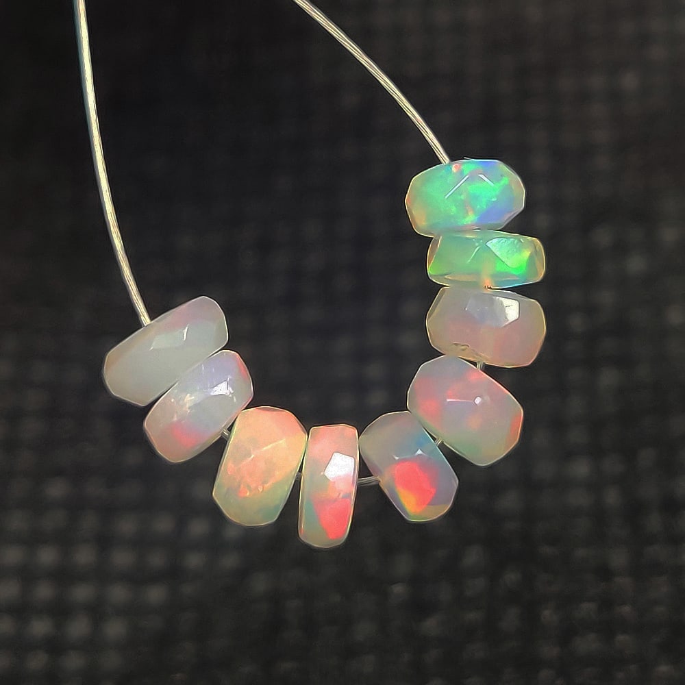 2.37 Ct Natural Multicolor Welo Opal Flash Fire Round Beads: Weight - 2.37 Ct / Dimensions - 4.40 - 4.90 mm / 9 Pc's / Shape & Cut - Drilled Round Beads / Color - Multicolor / Transparency - Translucent / Origin - Ethiopia / Comments - None