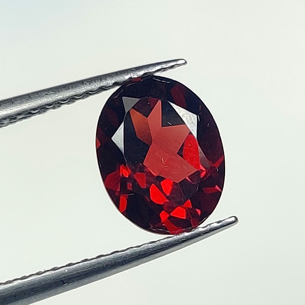 2.42 Ct Natural Almandite Garnet Oval Cut: Weight - 2.42 Ct / Dimensions - 9.00 x 7.00 x 4.50 mm / Shape - Oval Cut / Clarity - VVS / Origin - Nigeria / Treatment - None