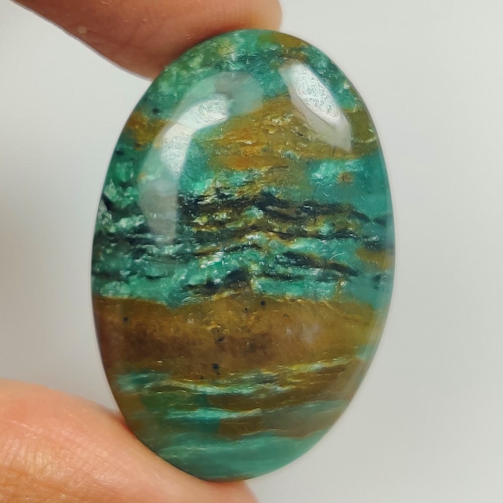 26.01 Ct Natural Gary Green Jasper Quartz Oval Cab: weight - 26.01 Ct / Dimensions - 30.00 x 19.10 x 5.60 mm / Shape & Cut - Excellent Oval Cab / Origin - Brazil / Comments - None
