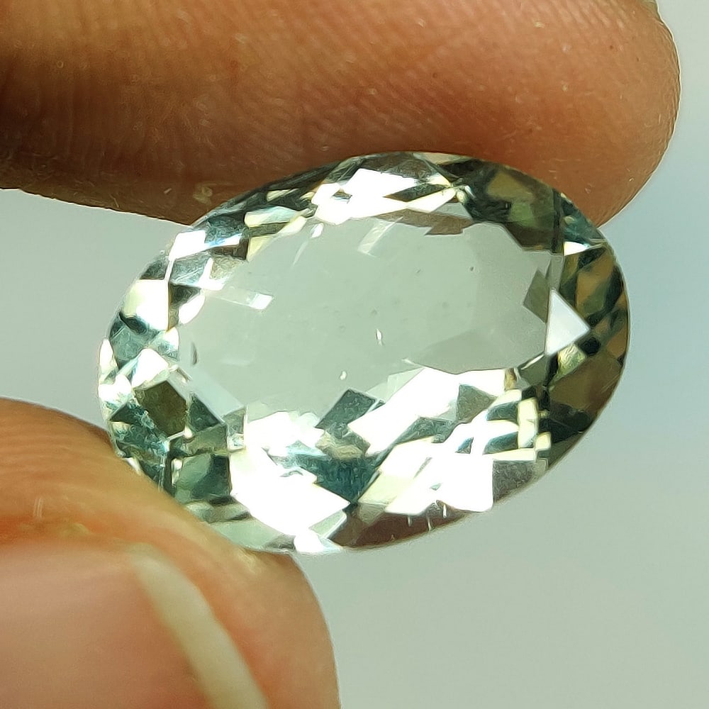 5.07 Ct Natural Green Amethyst Oval Cut: Weight - 5.07 Ct / Size - 14.10 x 10.10 x 6.00 mm / Shape - Oval Cut / Color - Green / Clarity - VVS / Origin - Brazil / Treatment - Heated