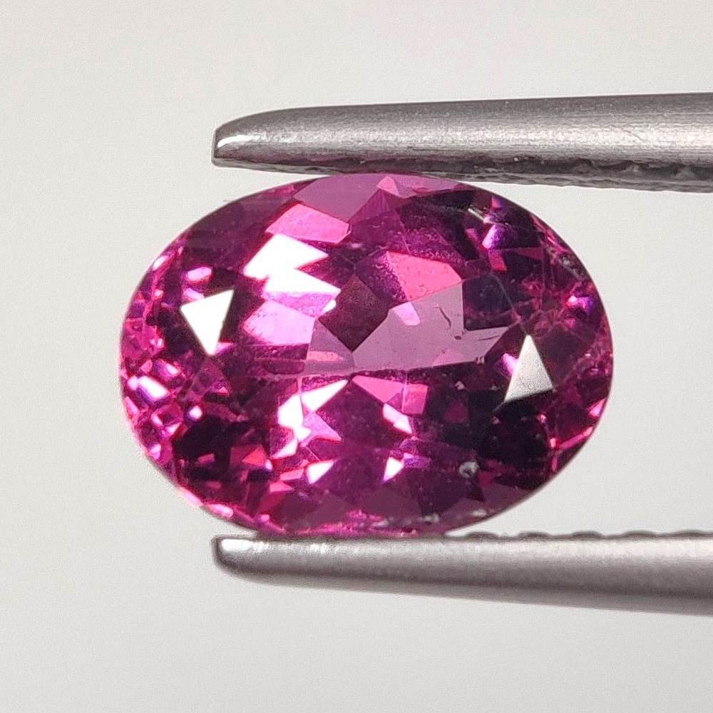 1.90 Ct Natural Rose Garnet Oval Cut: Weight - 1.90 Ct / Size - 8.00 x 6.00 x 4.60 mm / Shape - Oval Cut / Clarity - VVS / Origin - Nigeria / Treatment - None