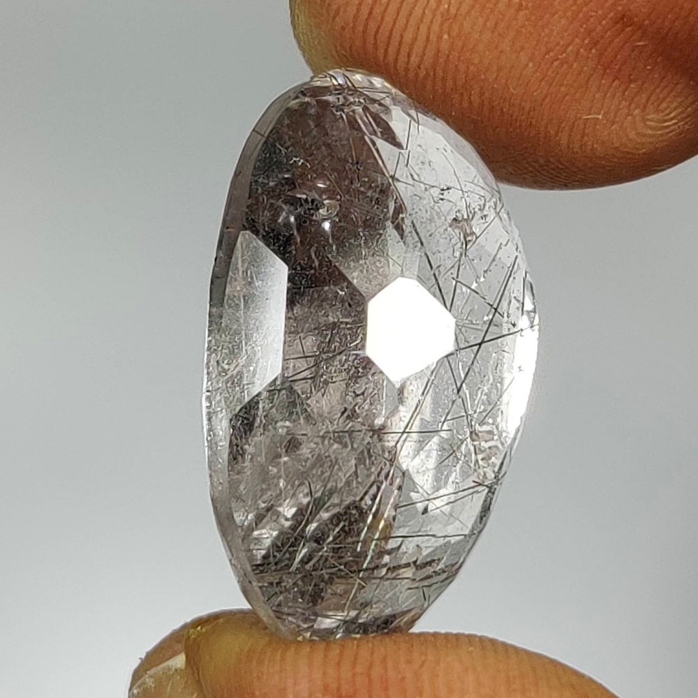 19.70 Ct Natural Rutile Quartz Oval Cut: Weight - 19.70 Ct / Dimensions -21.50 x 14.50 x 10.30 mm / Shape & Cut - Oval Cut / Transparency - Transparent / Origin - India / Comments - None