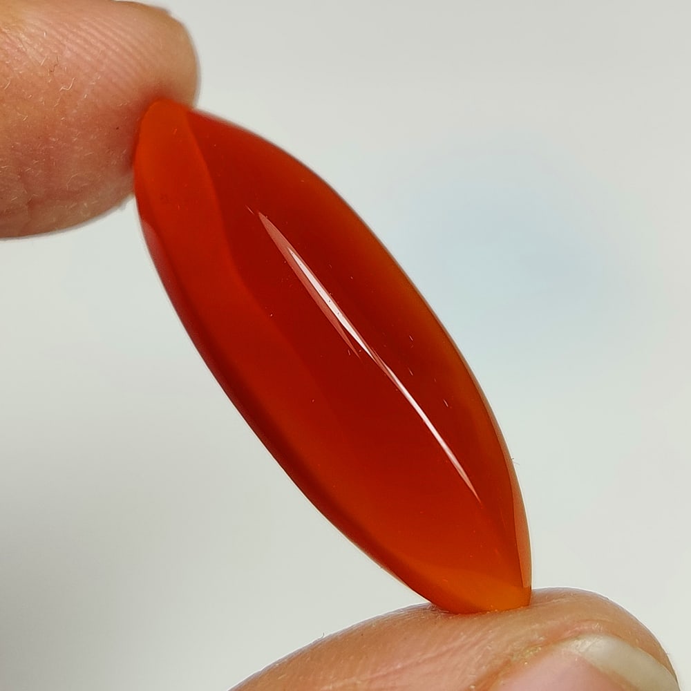 10.02 Ct Natural Red Onyx Marquise Cab: Weight - 10.02 Ct / Dimensions - 28.00 x 9.30 x 6.30 mm / Shape - Marquise Cab / Clarity - Opaque / Origin - Brazil / Treatment - None