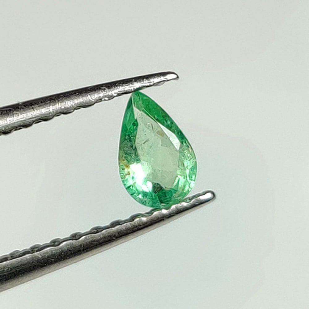 0.14 Ct Natural Zambian Green Emerald Pear Cut: Weight - 0.14 Ct / Dimensions - 4.80 x 3.10 x 1.80 mm / Shape - Pear Cut / Color - Green / Clarity - SI / Origin - Zambia / Treatment - Natural Emeralds are commonly enhanced by oil