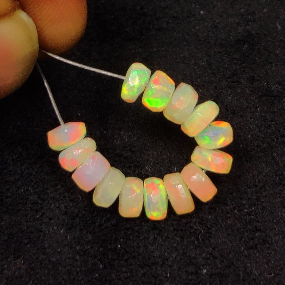 3.72 Ct Natural Multicolor Welo Opal Flash Fire Round Beads: Weight - 3.72 Ct / Dimensions - 4.10 - 4.70 mm / 14 Pc's / Shape & Cut - Round Beads / Color - Multicolor / Transparency - Translucent / Origin - Ethiopia / Comments - None