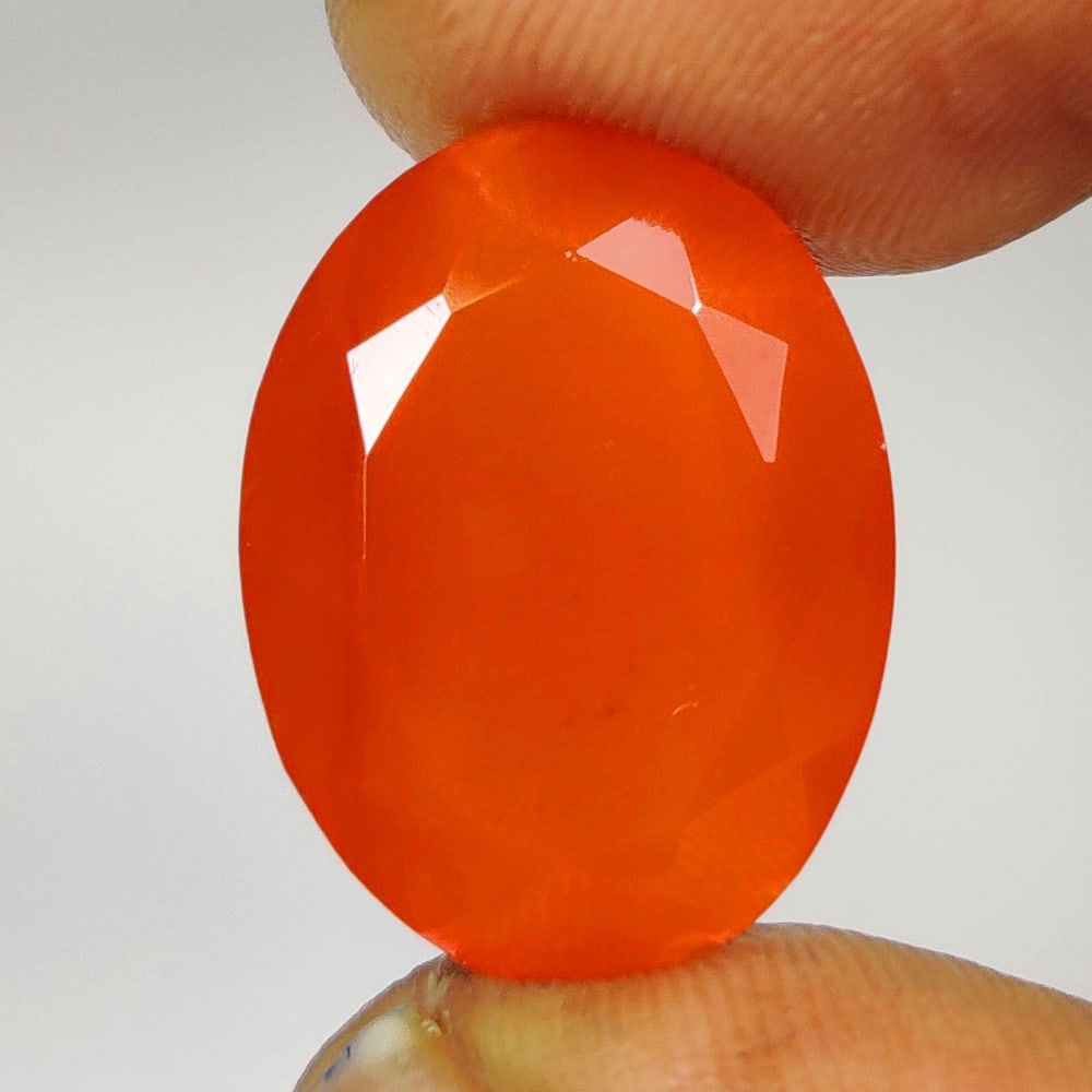 12.19 Ct Natural Orange Carnelian Oval Cut: Weight - 12.19 Ct / Dimensions - 18.30 x 15.30 x 8.40 mm / Shape - Oval Cut / Clarity - Semi - Opaque / Origin - Brazil