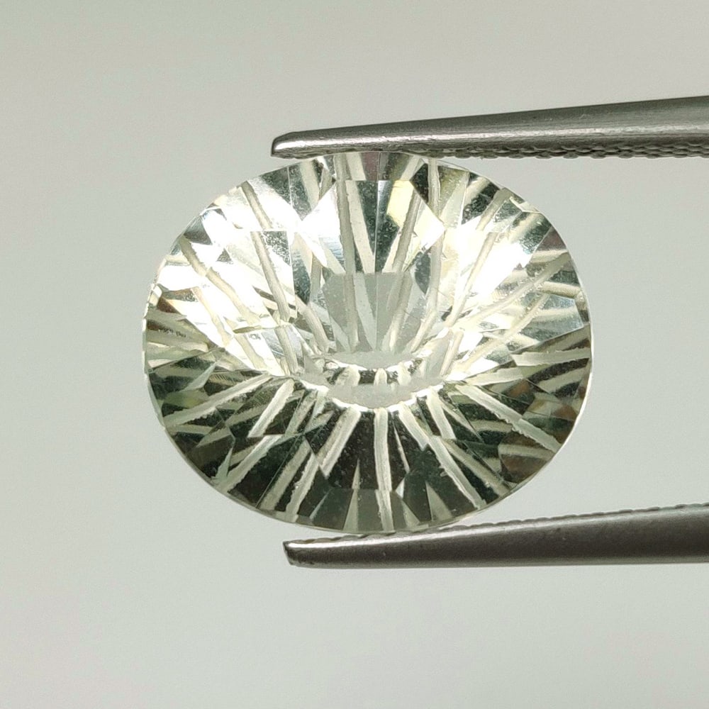 8.11 Ct Natural Green Amethyst Oval Cut: Weight - 8.11 Ct / Size - 14.00 x 12.00 x 9.40 mm / Shape - OVal Cut / Color - Green / Clarity - VVS / Origin - Brazil / Treatment - Heated