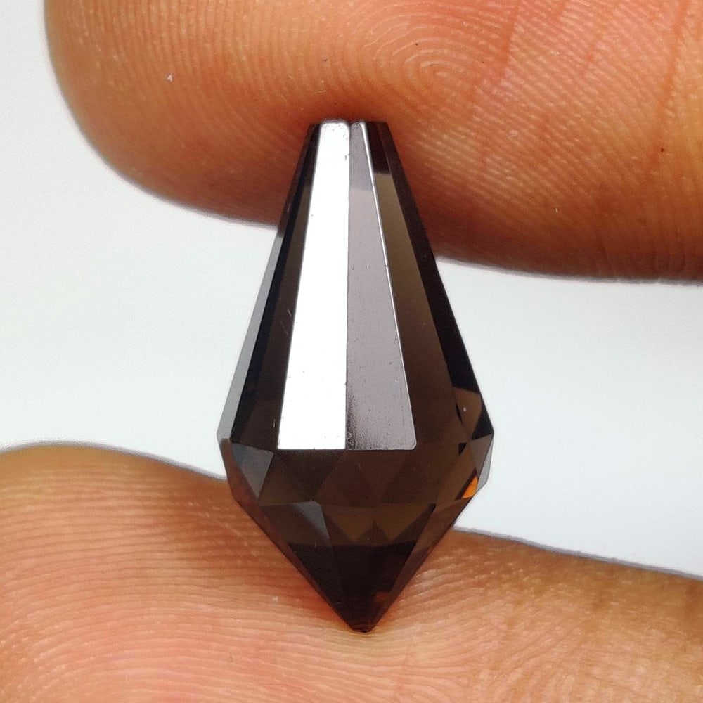 6.16 Ct Natural Smoky Quartz Fancy Drop: Weight - 6.16 Ct / Dimensions - 16.40 x 8.80 x 8.80 mm / Clariry - VVS / Top Quality Luster / Excellent Fancy Drop / Origin - Brazil / Comments - None