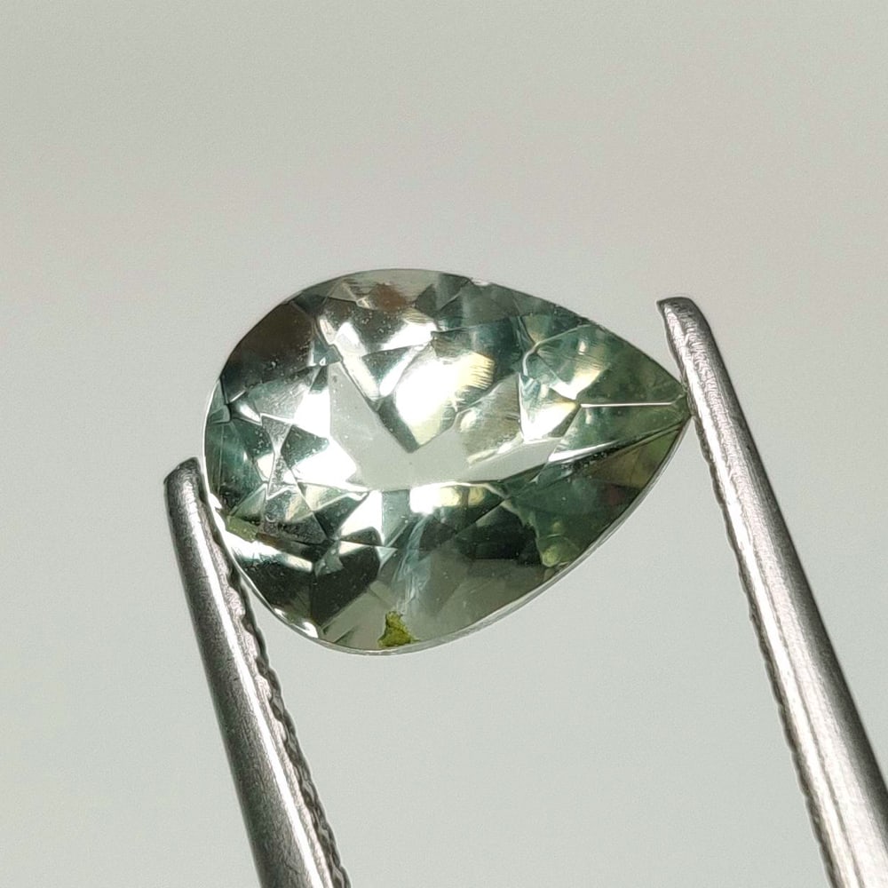 1.57 Ct Natural Green Amethyst Pear Cut: Weight - 1.57 Ct / Size - 8.90 x 7.00 x 5.00 mm / Shape - Pear Cut / Color - Green / Clarity - VVS / Origin - Brazil / Treatment - Heated