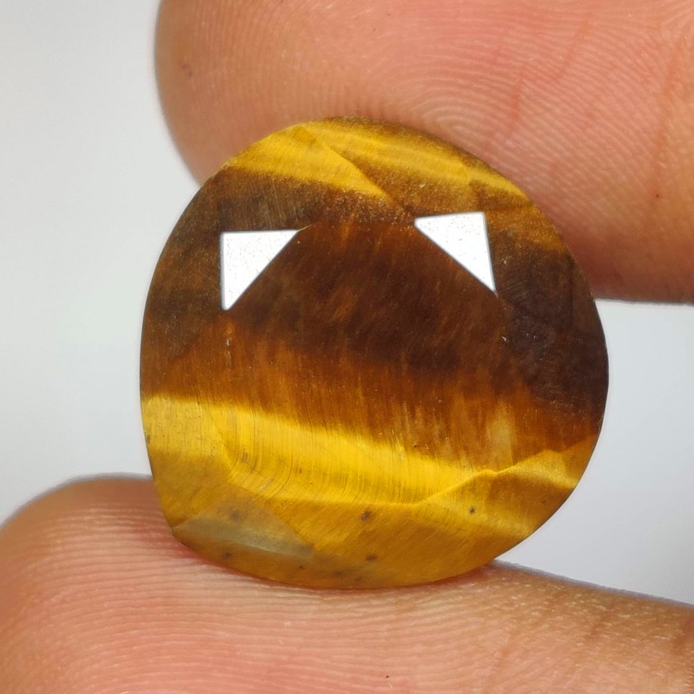 13.35 Ct Natural Tiger Eye Pear Cut: Weight - 13.35 Ct / Dimensions - 17.50 x 17.20 x 7.70 mm / Top Class Quality / Pear Cut / Origin - Burmese / Comments - None