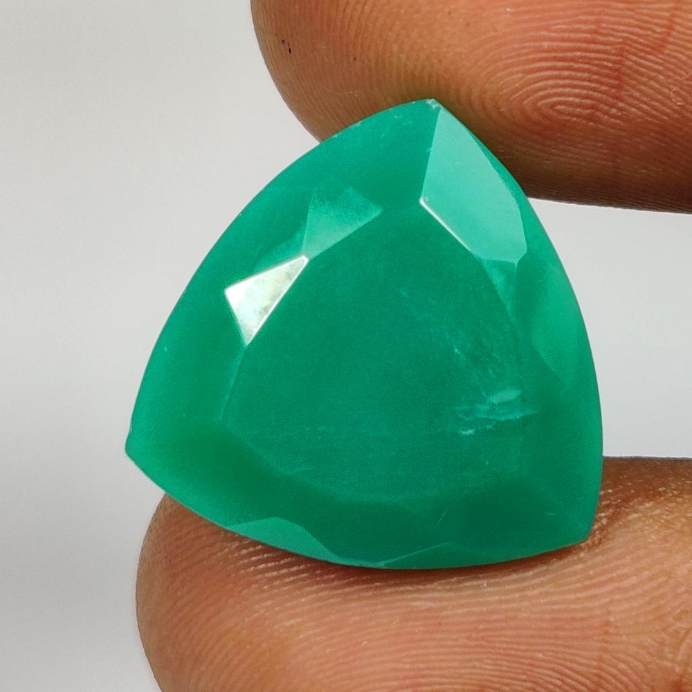 11.67 Ct Natural Green Chrysoprase Trillion Cut: Weight - 11.67 Ct / Size - 17.40 x 17.20 x 7.60 mm / Shape - Trillion Cut / Clarity - Opaque / Origin - Brazil / Treatment - None