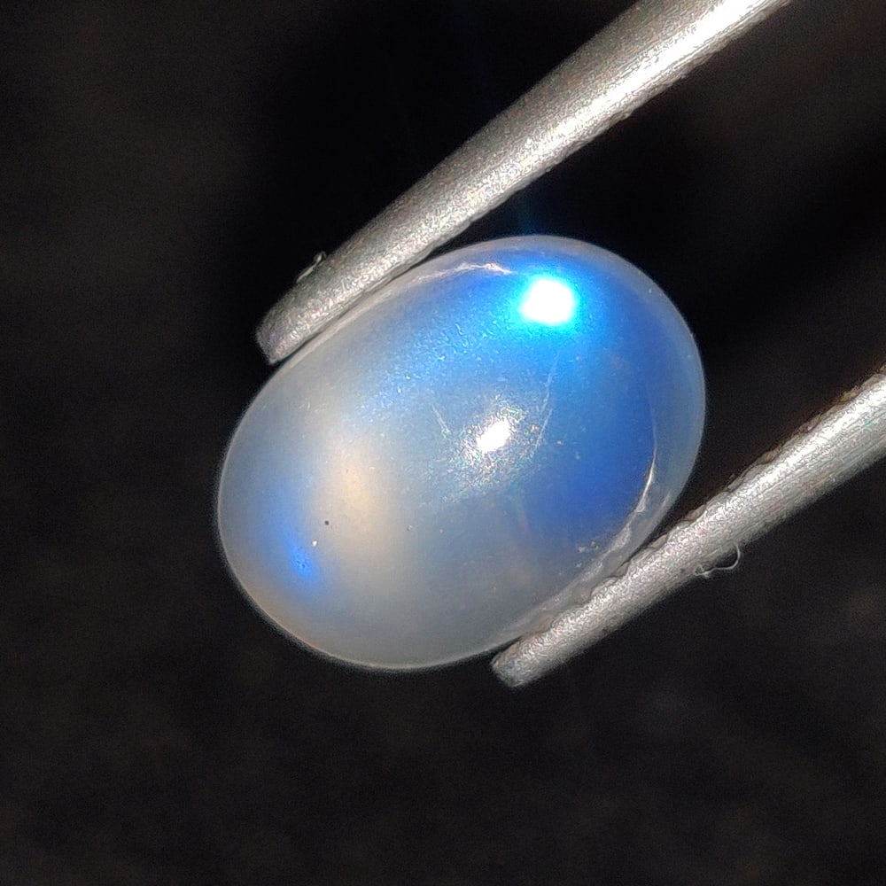 1.93 Ct Natural Blue Tint Moonstone Oval Cab: Weight - 1.93 Ct / Dimensions - 9.40 x 6.60 x 4.50 / Shape - Oval cab / Clarity - Semi-Transparent / Origin - India / Treatment - None