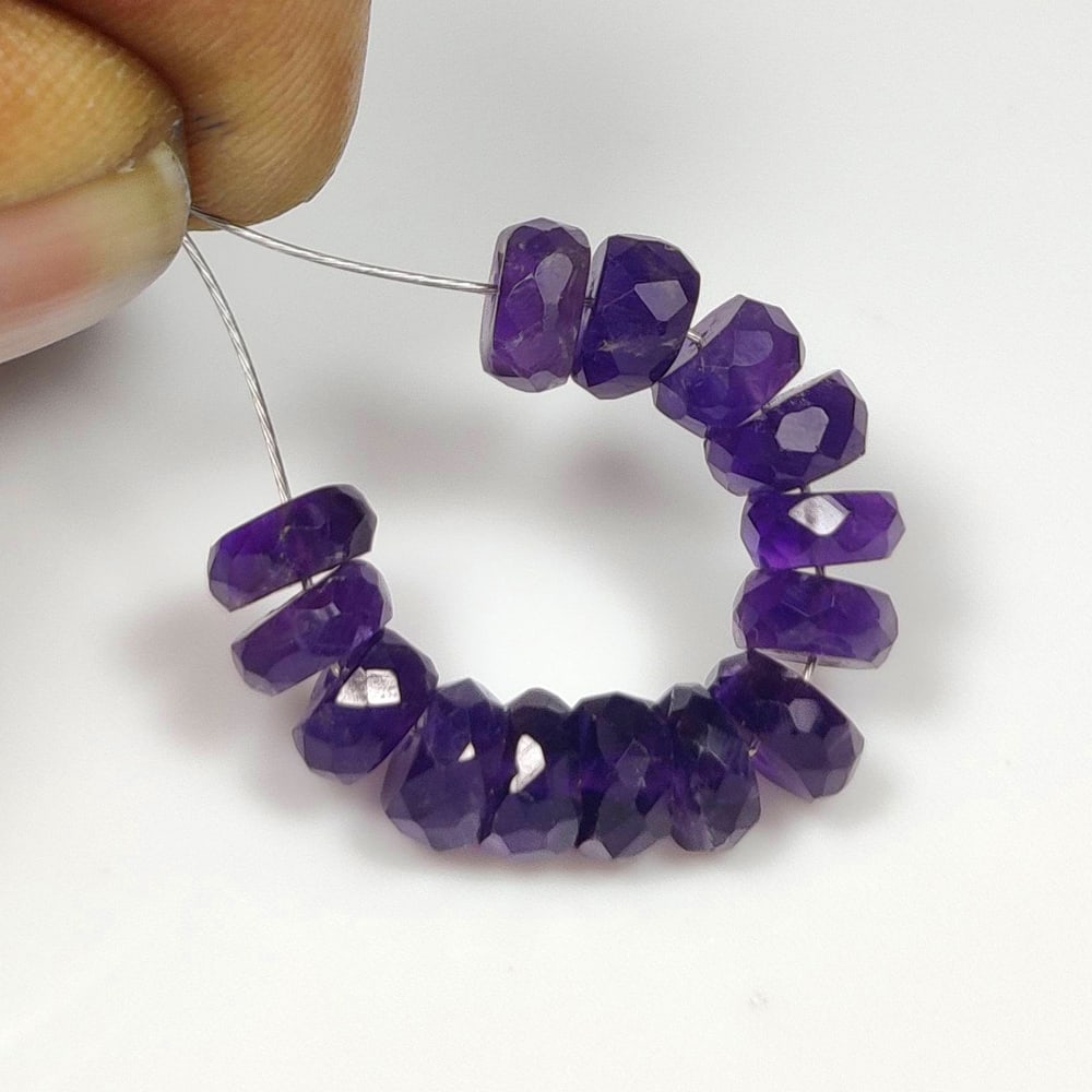 10.88 Ct Natural Purple Amethyst Round Cut Beads: Weight - 10.88 Ct / Dimensions - 5.70 - 5.80 mm / 14 Pc's / Shape - Round Cut Beads / Color - Purple / Clarity - VVS / Origin - Brazil / Treatment - Heated
