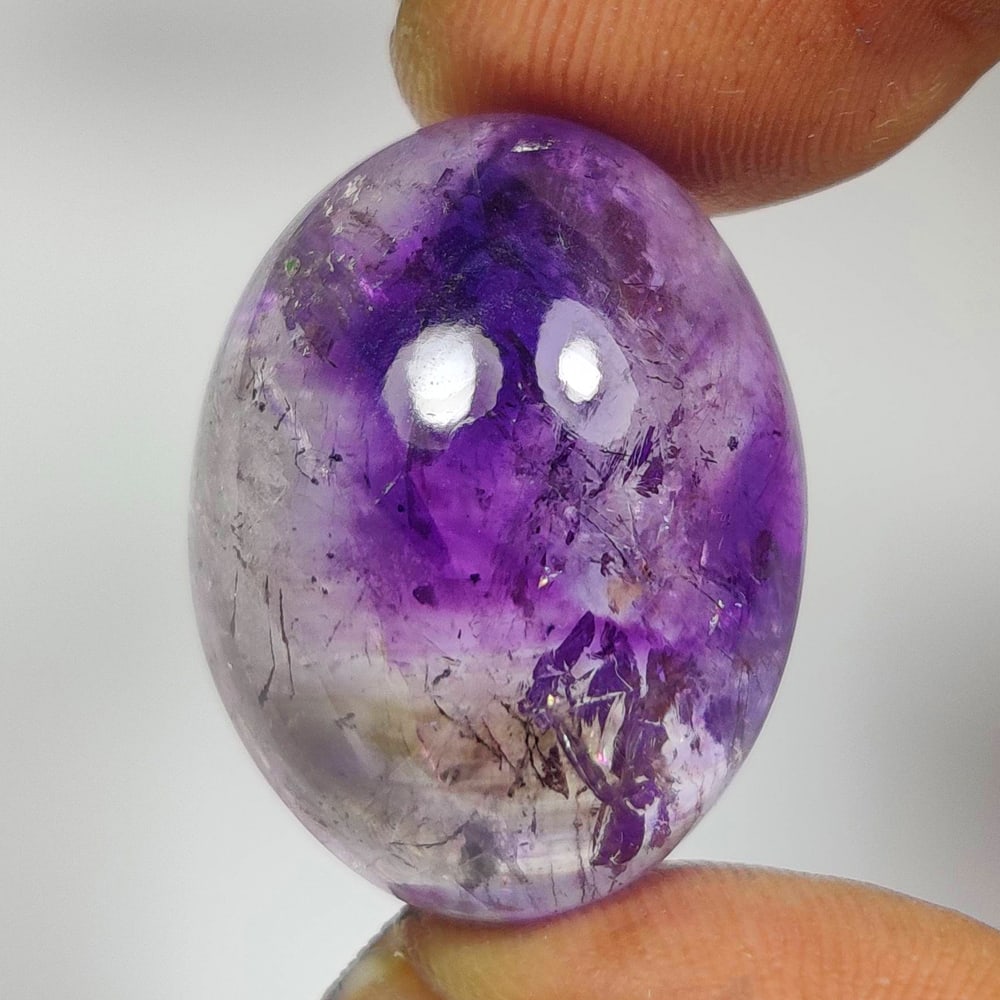 37.42 Ct Natural Rutile Amethyst Quartz Oval Cab: Weight - 37.42 Ct / Size - 24.00 x 17.70 x 12.70 mm / Shape - Oval Cab / Clarity - Transparent / Origin - Norway / Treatment - None