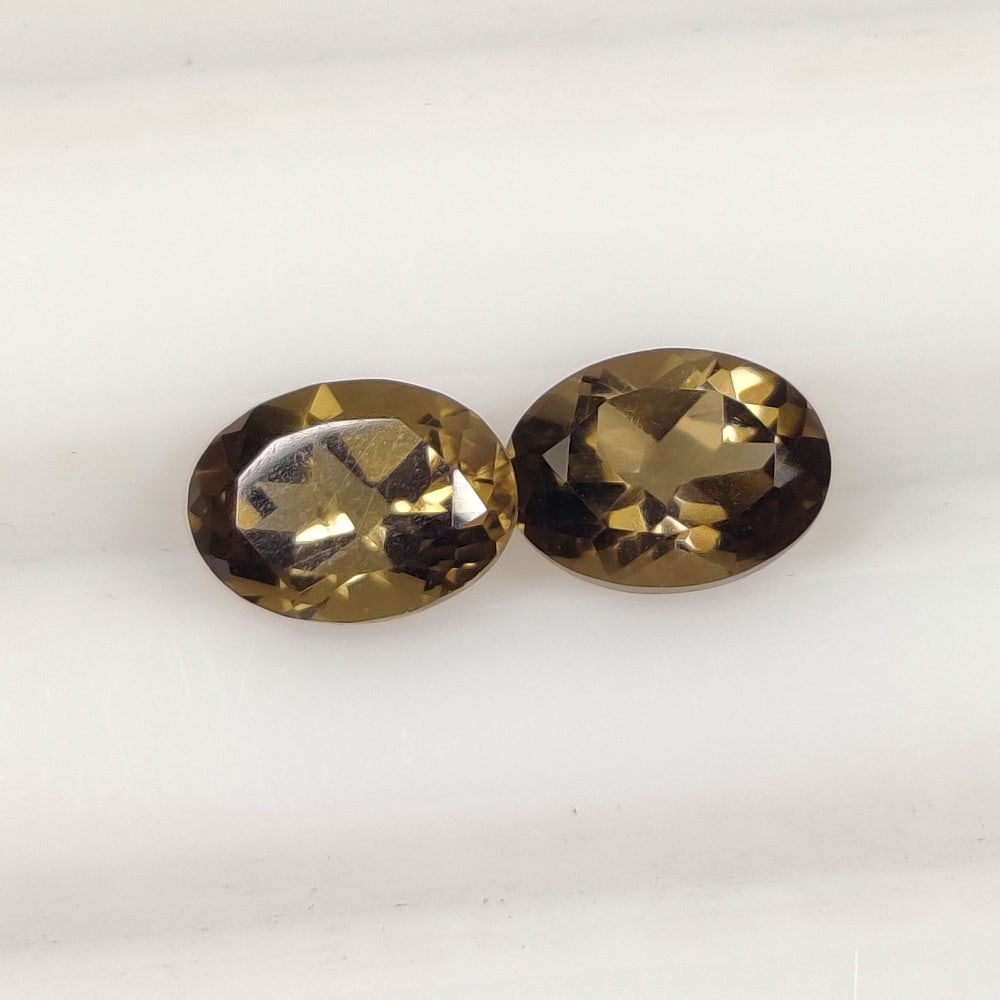 1.50 Ct Natural Choco Smoky Quartz Oval cut Pair: Weight - 1.50 Ct / Size - 6.80 x 5.10 x 3.90 mm / 2 Pc's / Clariry - VVS / Top Quality Luster / Excellent Oval Cut / Origin - Brazil / Treatment - None