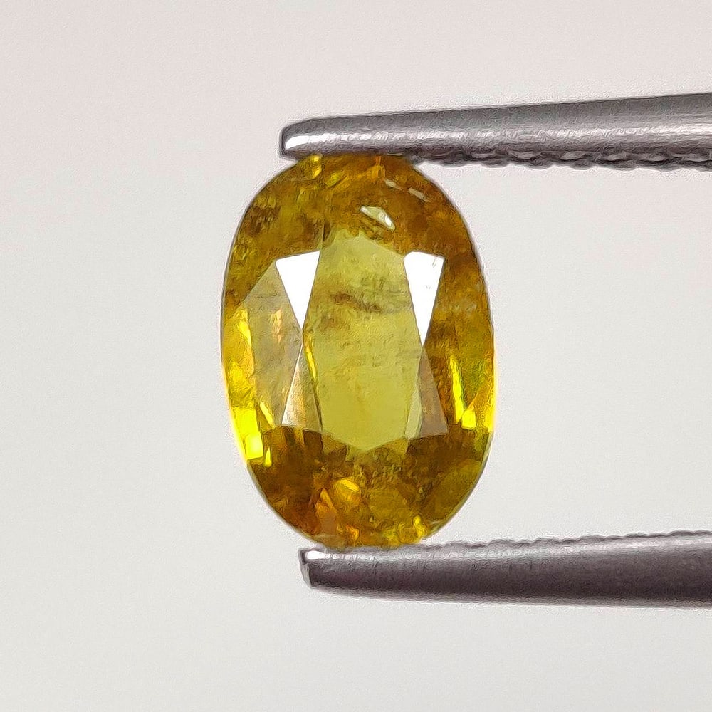 0.95 Ct Natural Sphene Oval Cut: Weight - 0.95 Ct / Size -7.80 x 5.30 x 2.70 mm / Shape - Oval Cut / Color - Deep Yellow / Clarity - VVS / Origin - Myanmar / Treatment - None