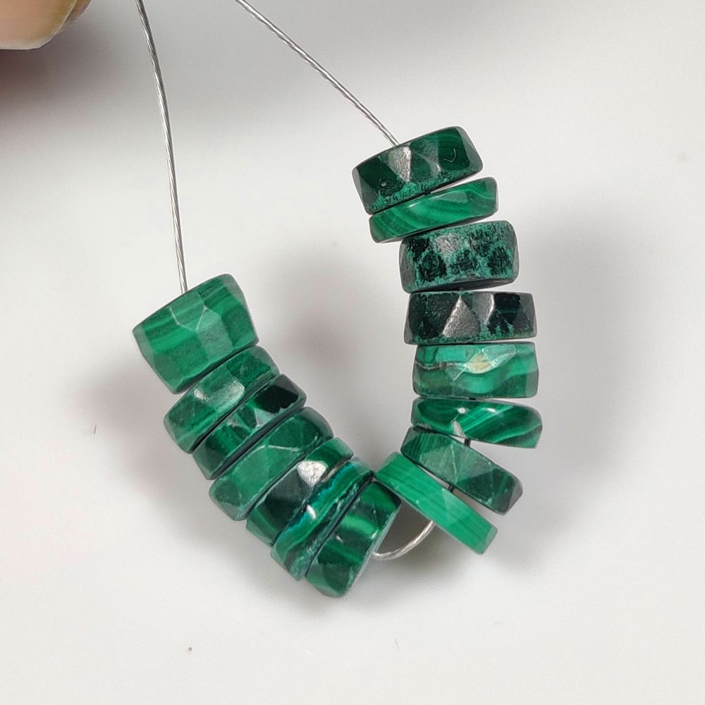 24.26 Ct Natural Green Malachite Round Beads: Weight - 24.26 Ct / Dimensions - 6.60 - 7.50 mm / 15 Pc's / Shape - Round Beads / Color - Green / Clarity - Opaque / Origin - Russia / Treatment - None