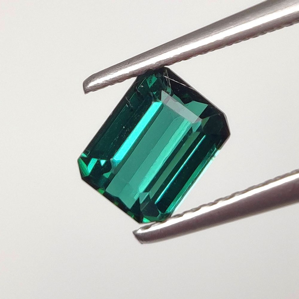 1.25 Ct Natural Indigolite Color Tourmaline Octagon Cut: Weight - 1.25 Ct / Dimensions - 6.90 x 5.40 x 4.00 mm / Shape - Octagon Cut / Color - Green / Clarity - Translucent / Origin - Africa / Treatment - None