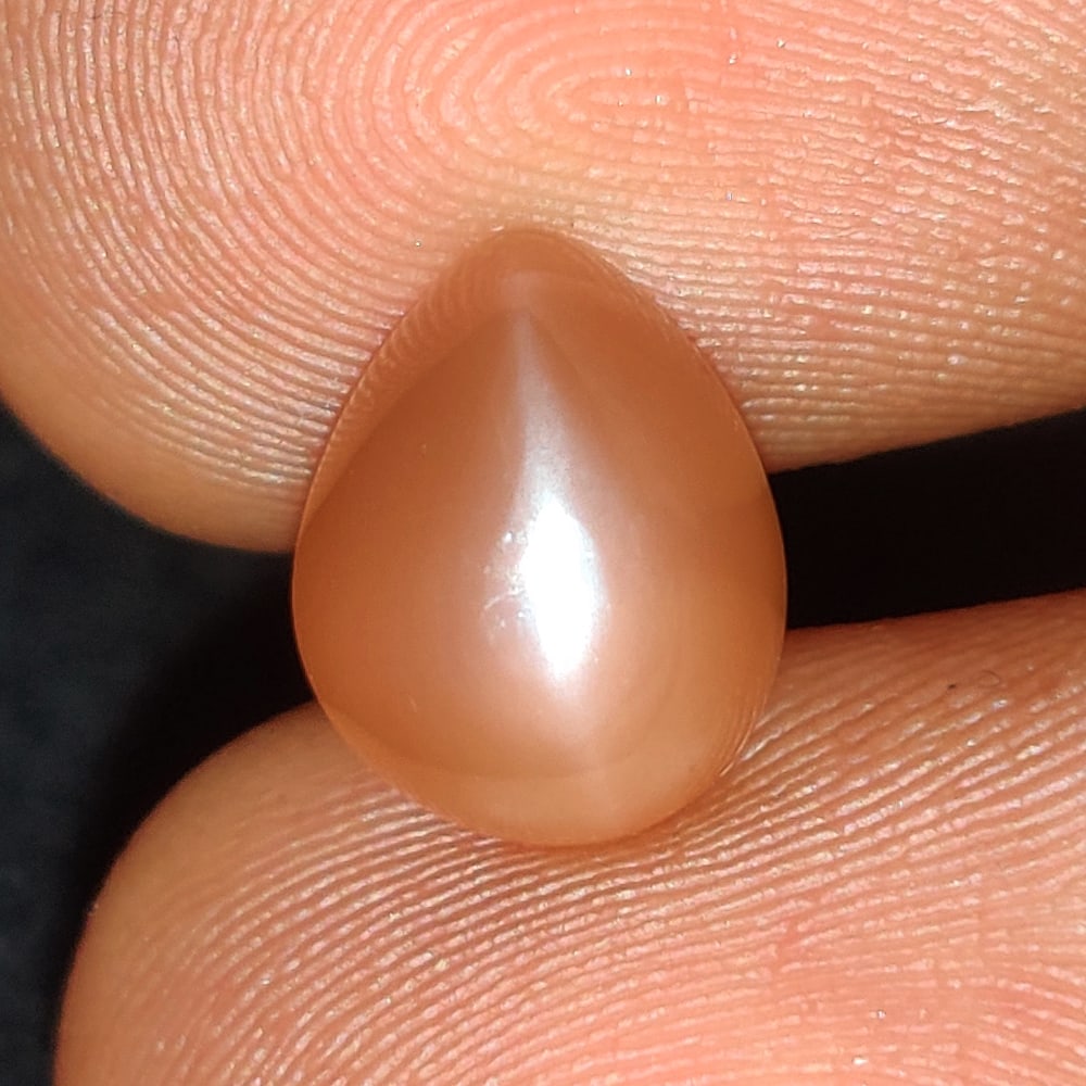 2.22 Ct Natural Orange Moonstone Pear Cab: Weight - 2.22 Ct / Size - 9.40 x 7.60 x 4.80 mm / Shape - Pear Cab / Clarity - Semi-Transparent / Origin - India / Treatment - None
