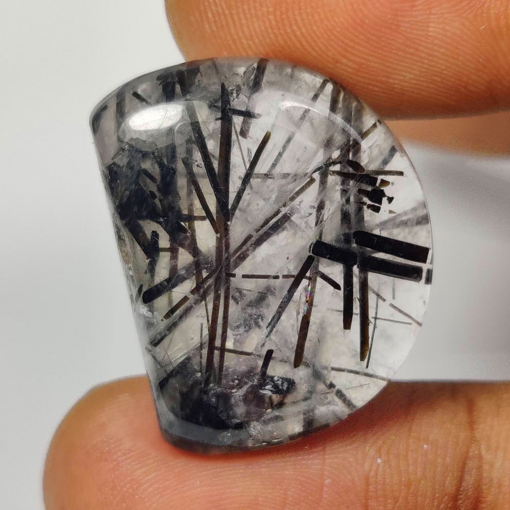27.46 Ct Natural Rutile Quartz Fancy Cab: Weight - 27.46 Ct / Dimensions - 25.00 x 19.30 x 6.30 mm / Shape & Cut - Fancy Cab / Transparency - Transaprent / Origin - India / Comments - None