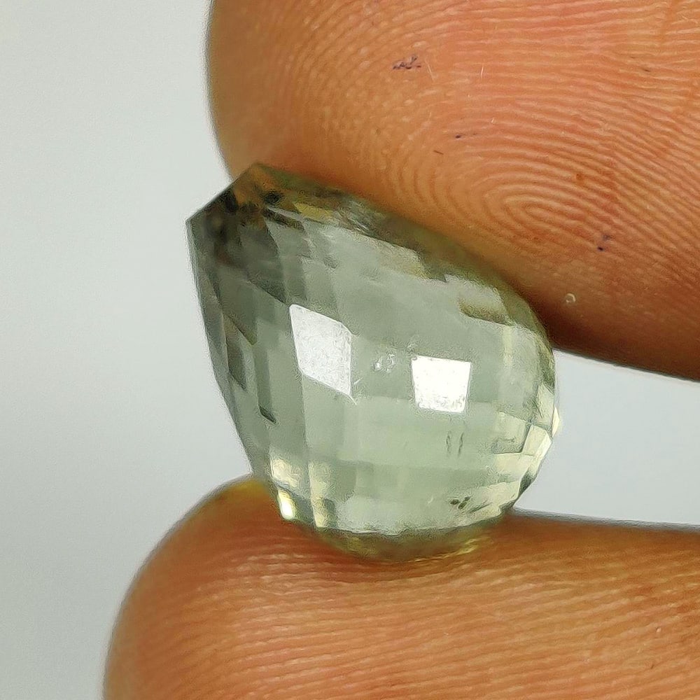 6.58 Ct Natural Green Amethyst Pear Briolette: Weight - 6.58 Ct / Dimensions - 12.40 x 9.20 mm / Shape - Pear Briolette / Color - Purple / Clarity - VVS / Origin -Brazil / Treatment - Heated